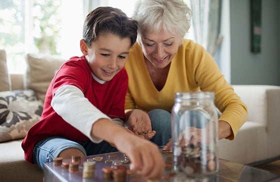 Grandma and grandson learning about money