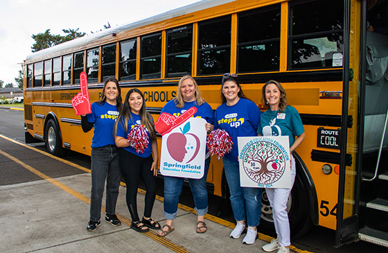 SELCO Community credit union employees showing support for educators. 